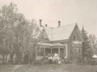 Front View of Stevens House with People on Porch