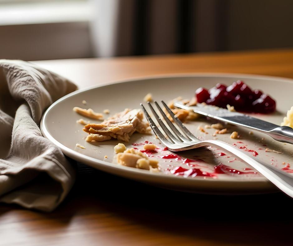 Photo of a plate with leftover pie crumbs on it. 